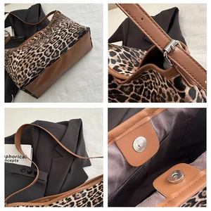 Detail view of leopard print tote bag with adjustable leather strap and magnetic closure
