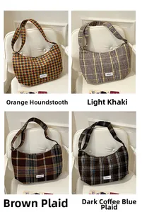 Detail view of retro plaid dumpling bags in four colors: orange, khaki, brown, and blue