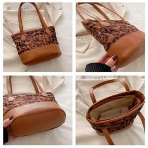 Detailed views of leopard print tote bag with brown faux leather trim and interior space