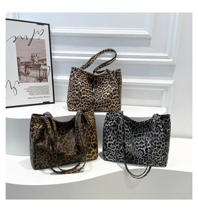 Three colors of leopard print tote bags in brown, dark coffee and grey displayed together