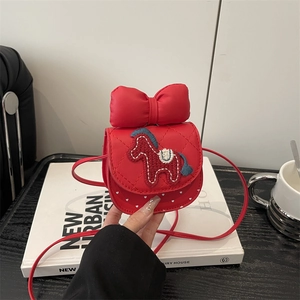 Red mini crossbody bag for girls with pony embroidery and a large bow detail