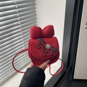 Red quilted crossbody bag for girls with pony embroidery and decorative bow