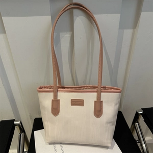 Large capacity minimalist tote bag in off-white fabric with pink leather handles and trim