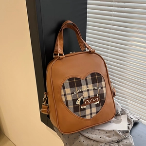 Vintage brown leather backpack with heart-shaped plaid puppy embroidery and metal hardware