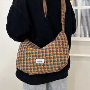 Colorful plaid patterned dumpling bag with a shoulder strap for women's autumn casual fashion