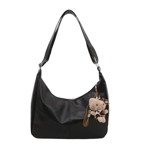 Fashionable black PU leather hobo tote bag with a cute leopard cat plush pendant