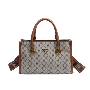 Retro tote bag in brown leather and chain print canvas with wide woven strap