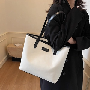 Minimalist large-capacity monochrome tote bag with black contrast trim for women