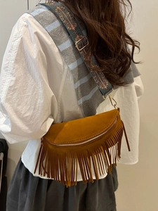 Bohemian brown suede tassel half-moon bag with ethnic embroidered wide shoulder strap