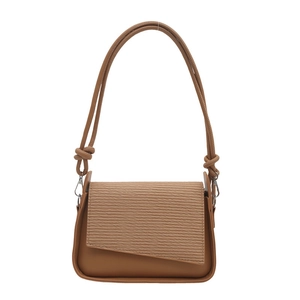 Minimalist brown faux leather shoulder bag with diagonal textured flap in a clean style