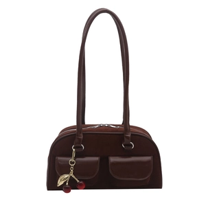 Retro dark brown suede bowling bag with dual front pockets and cherry charm detail