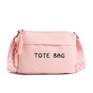 Pink corduroy tote bag with TOTE BAG embroidery and wide patterned shoulder strap