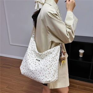 Large vintage canvas tote bag with heart bow pattern and cute bear plush charm