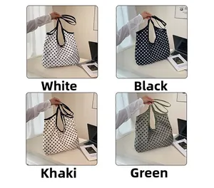 Detailed grid view showing large polka dot tote bags in white, black, khaki, and green colors