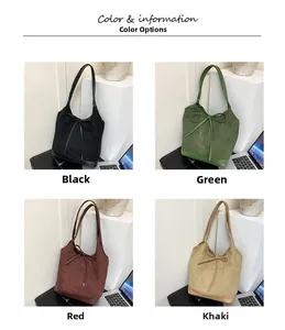 Close-up of four minimalist tote bags in black, green, brown, and khaki matte fabric
