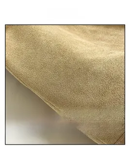 Detailed view of the wear-resistant khaki suede fabric with soft matte fiber texture
