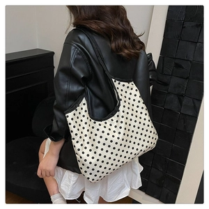 Minimalist large capacity polka dot canvas tote bag for women with black trim detail