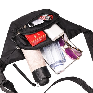 Detailed top view of a black nylon crossbody bag showing large internal storage capacity