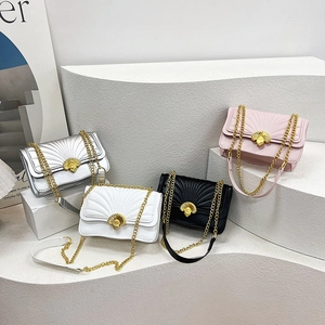Chic quilted crossbody bags with shell-shaped gold locks and chain straps in four colors