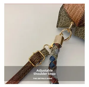 Close-up of adjustable strap and vintage patchwork leather bag with golden metal buckle