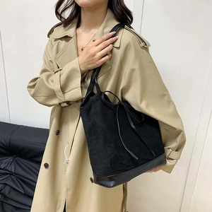 Chic black autumn tote bag in suede and leather, minimalist large shoulder bag for women