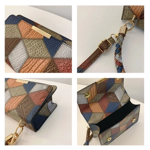 Detail showing geometric patchwork leather texture and golden metal hardware of women's bag