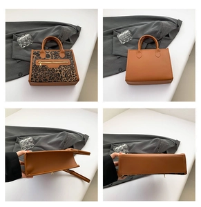 Detail view of the leopard print tote bag showing front, back, top opening, and base