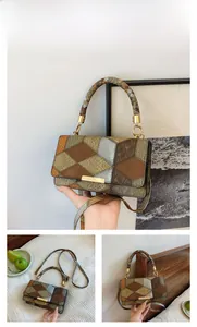 Macro shot of patchwork retro shoulder bag featuring embossed leather textures and gold clasp