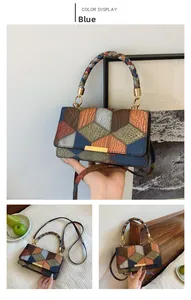 Detail of vintage patchwork handbag featuring blue faux leather and woven texture handle