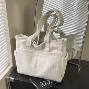 Minimalist beige corduroy tote bag with large capacity and double front pockets
