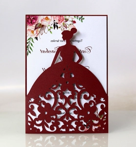 Elegant laser-cut dark red wedding invitation with floral dress silhouette and pearl card