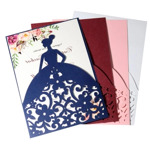 Elegant laser-cut wedding invitations featuring a female silhouette with floral cutout patterns