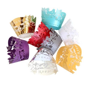 Laser cut pearlescent cupcake wrappers in 7 colors with It's a Boy crown pattern