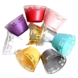 Laser cut teapot cupcake wrappers in multiple colors made of glossy pearlescent paper