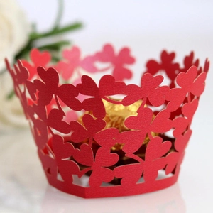 Red laser-cut heart pattern cupcake wrappers for wedding cake decoration and favors
