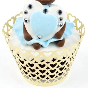 Laser-cut heart cupcake wrappers in beige gold with a cute bear heart cake topper decor
