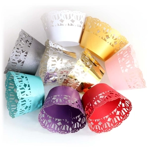 Laser-cut rose cupcake wrappers in multiple metallic and pearl colors for wedding party decor
