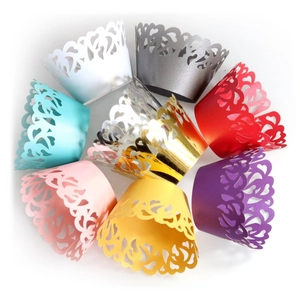 Laser cut heart lace cupcake wrappers in multiple metallic colors for weddings