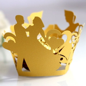Golden laser cut hollow heart cupcake wrapper for weddings with elegant couple silhouette