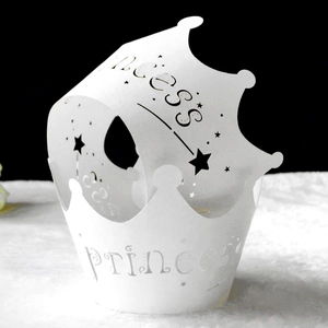 Pink princess crown laser cut cupcake wrappers with hollow star patterns and princess text