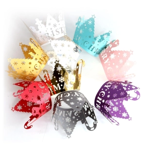 Laser-cut Christmas cupcake wrappers with tree and snowflake patterns in 8 vivid colors