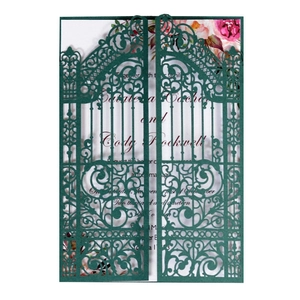 Laser cut dark green wedding invitation with gate design and floral insert card