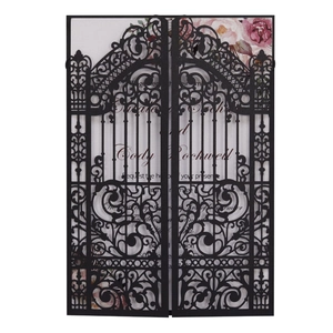 Elegant laser cut black wedding invitation card with floral insert and intricate door design
