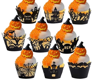 Laser-cut Halloween cupcake liners with black castle, bat and spider web patterns
