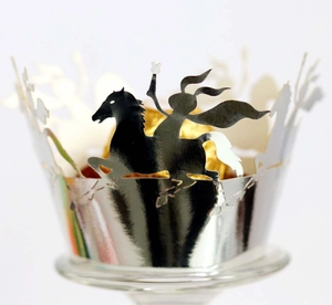 Detailed laser-cut silver cupcake wrapper featuring a running horse design for party decor