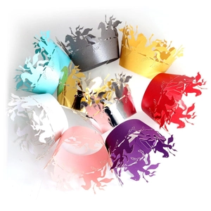 Laser cut cupcake wrappers with horse and rider silhouette in various vibrant colors