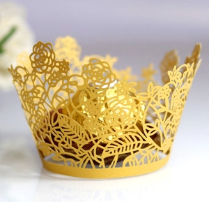 Elegant laser cut pearl gold cupcake wrappers with intricate rose flower hollow patterns