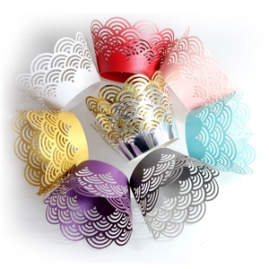 Laser cut hollow cupcake wrappers in various colors for muffin decoration and party supplies