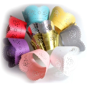 Laser-cut rose cupcake wrappers in vibrant metallic and matte colors for party decor