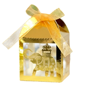 Golden laser-cut elephant candy box with a yellow ribbon for parties and celebrations